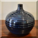 D12. Blue pottery vase. 